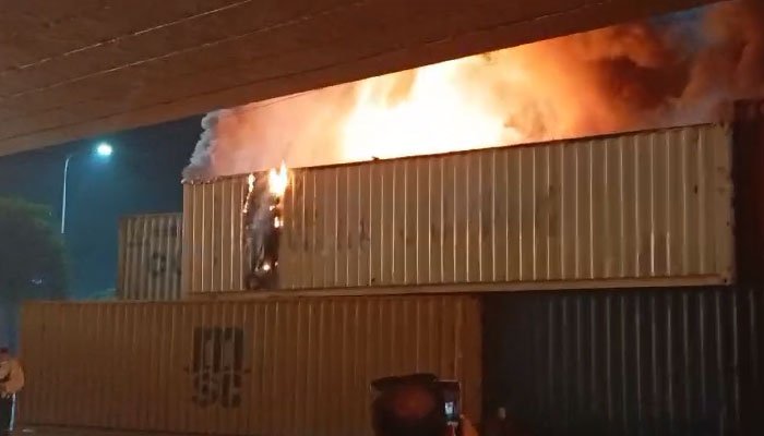 Fire breaks out in containers placed to block PTI protest in Islamabad Fire breaks out in containers place to block PTI protest in Islamabad
