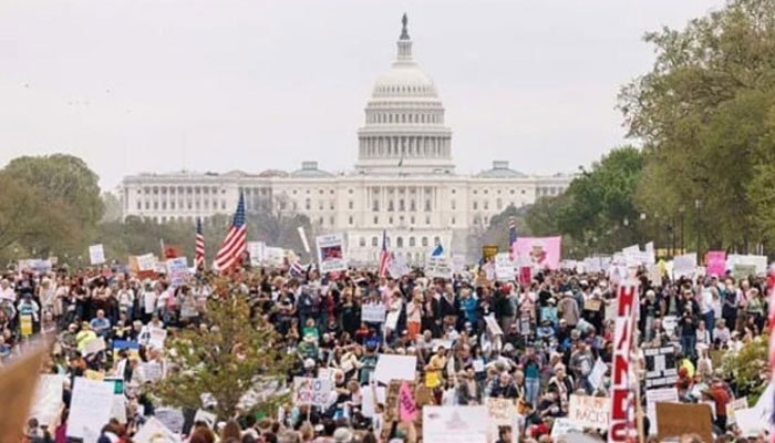Global "Hands Off" Protests Erupt Against Trump and Elon Musk's Policies