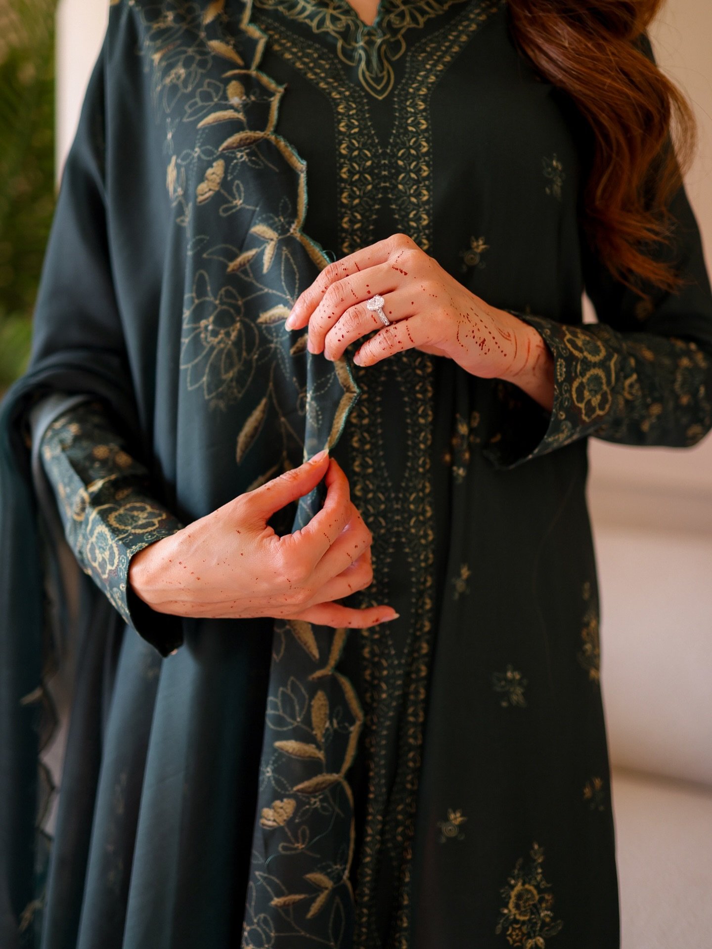 Nyla Poses with Mehndi on her hands from her marriage ceremony 