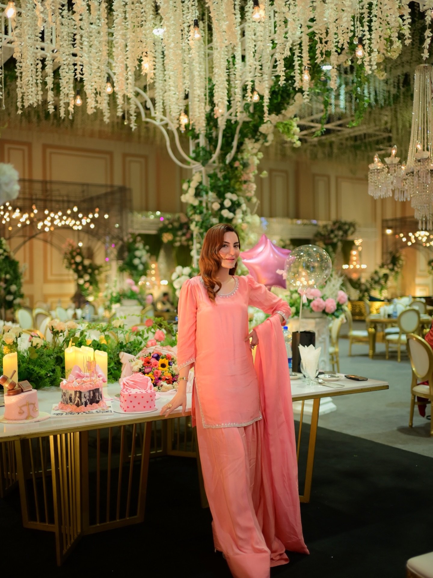 Nyla Raja wears pink outfit